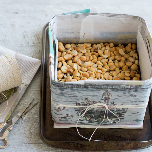 Preparing a cake tin for baking a rich fruit cake